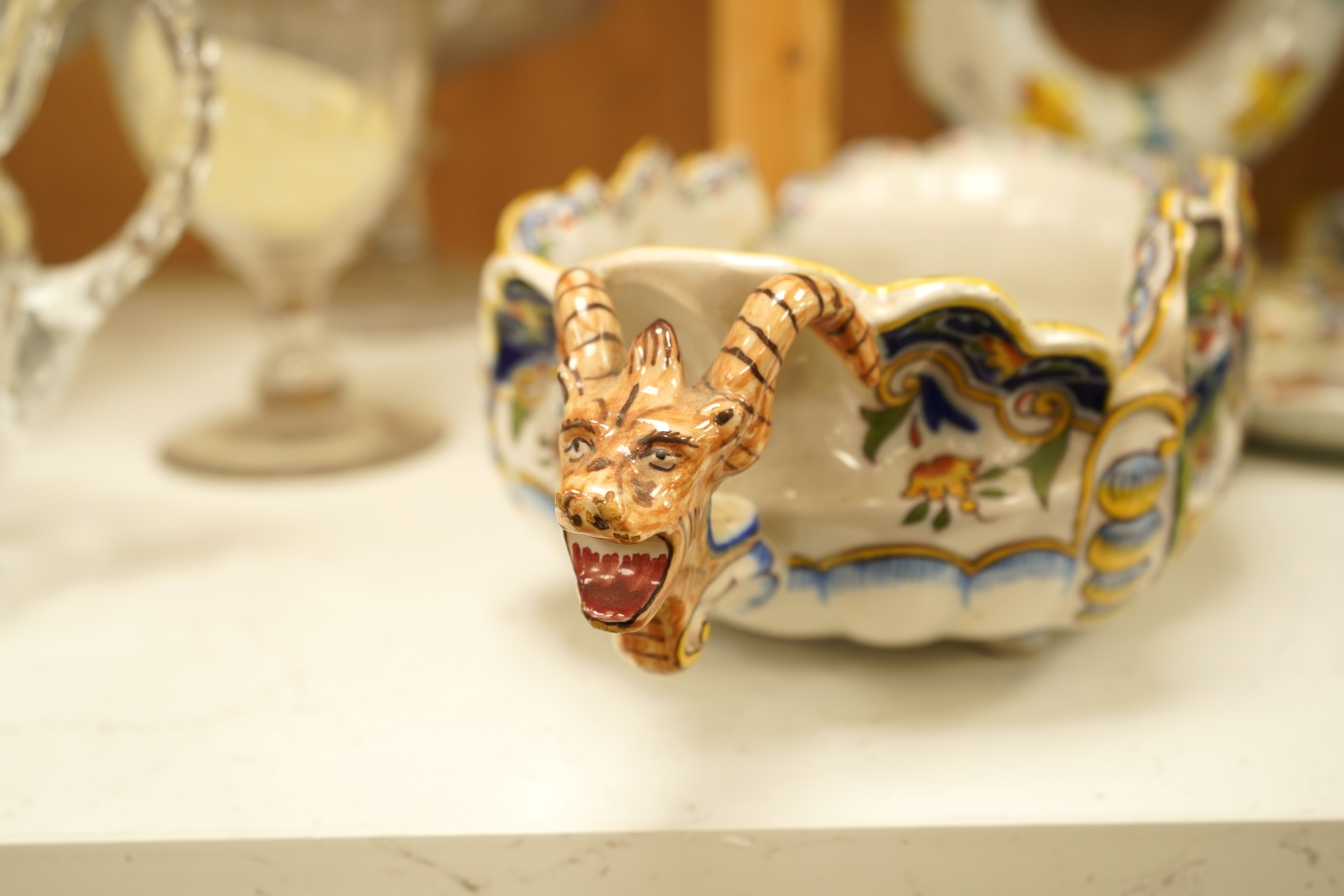 A collection of early 20th century French faience pieces To include dishes, an inkwell and a large ewer, 42cm high